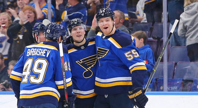 St. Louis Blues center Oskar Sundqvist (70) is congratulated by teammates Colton Parayko St. Louis Blues center Oskar Sundqvist (70) is congratulated by teammates Colton Parayko