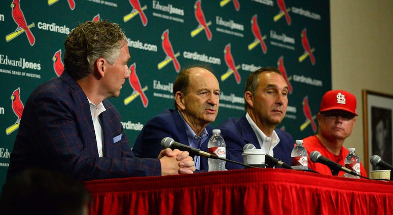 St. Louis Cardinals interim manager Mike Shildt (83) and president of baseball operations John Mozeliak and chairman Bill DeWitt Jr and general manager Mike Girsch talk during a press conference. St. Louis Cardinals interim manager Mike Shildt (83) and president of baseball operations John Mozeliak and chairman Bill DeWitt Jr and general manager Mike Girsch talk during a press conference.