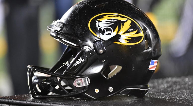 Missouri football helmet sits on the bench Missouri football helmet sits on the bench