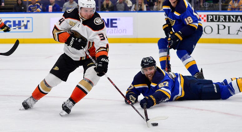 Anaheim Ducks center Sam Steel (34) handles the puck as St. Louis Blues defenseman Alex Pietrangelo Anaheim Ducks center Sam Steel (34) handles the puck as St. Louis Blues defenseman Alex Pietrangelo