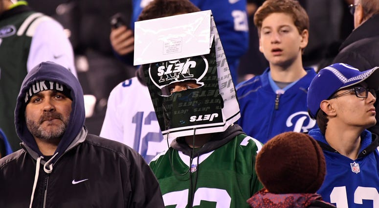 A New York Jets fan reacts in the fourth quarter A New York Jets fan reacts in the fourth quarter