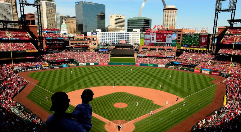 Fans look on as the Cincinnati Reds play the St. Louis Cardinals Fans look on as the Cincinnati Reds play the St. Louis Cardinals