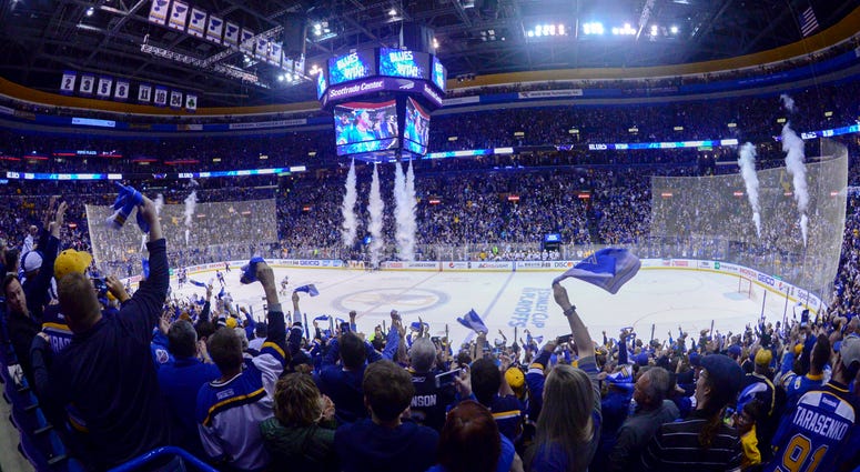 St. Louis Blues fans celebrate after a Blues victory at Scottrade Center. St. Louis Blues fans celebrate after a Blues victory at Scottrade Center.