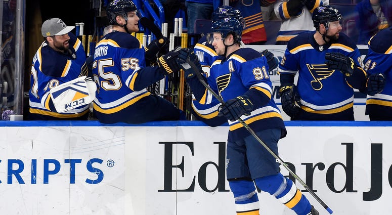 St. Louis Blues right wing Vladimir Tarasenko (91) is congratulated by teammates St. Louis Blues right wing Vladimir Tarasenko (91) is congratulated by teammates