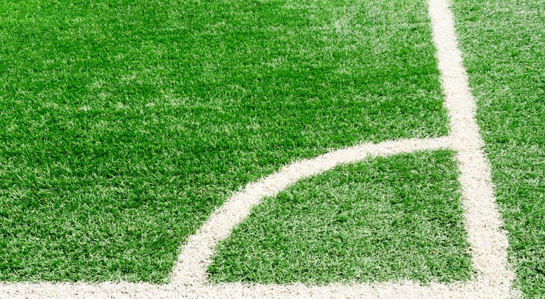 sports field White corner field line on artificial green grass of soccer field,Artificial turf football field