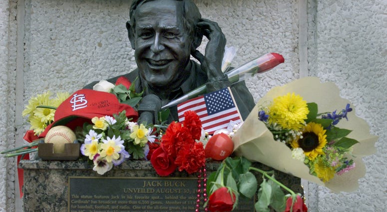 flowers and gifts adorn a bronze bust of the late Jack Buck, an announcer for the St. Louis Cardinals flowers and gifts adorn a bronze bust of the late Jack Buck, an announcer for the St. Louis Cardinals