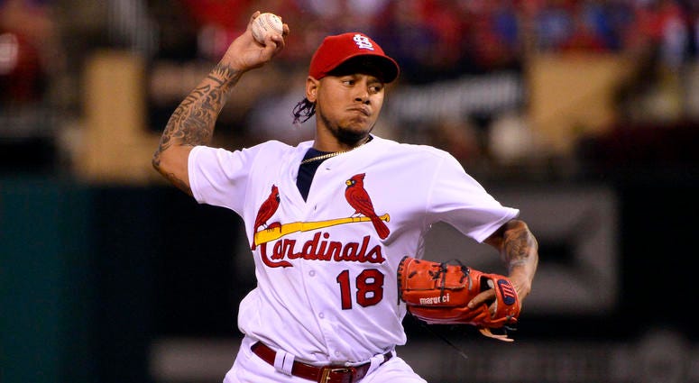 St. Louis Cardinals starting pitcher Carlos Martinez (18) pitches St. Louis Cardinals starting pitcher Carlos Martinez (18) pitches