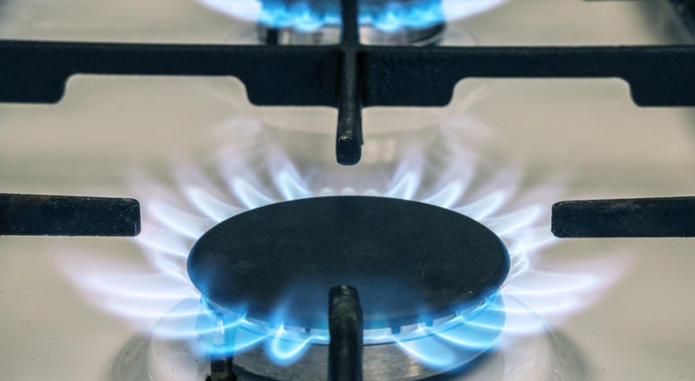 Gas stove flame on kitchen. Blue fire flame from stove.