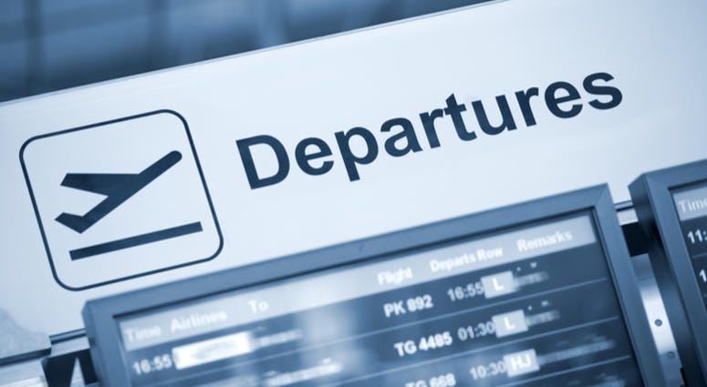 airport, departures Close up view of airport departures sign blue toned
