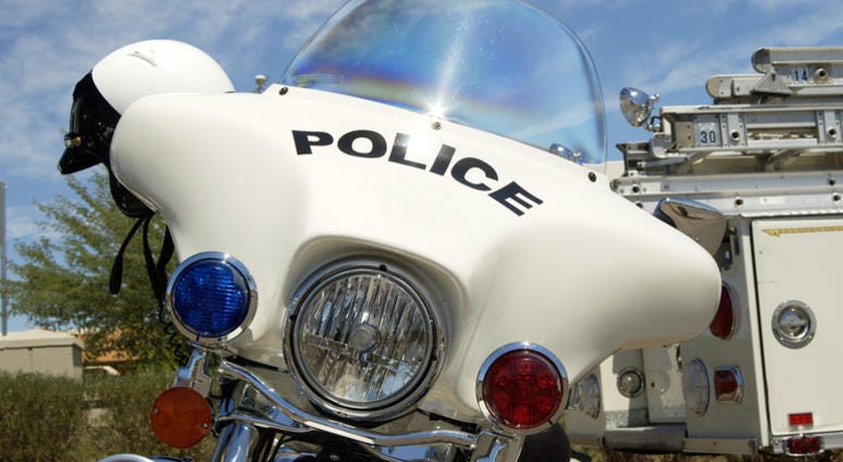 motorcycle, police Police motorcycle on display at a fundraising event.