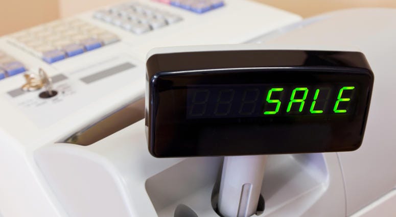 cash register, sales The word SALE on the display of a cash register