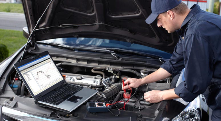 car mechanic Professional car mechanic working in auto repair service.