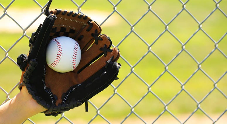 baseball, kids Hand of Baseball Player with Glove and Ball over Field