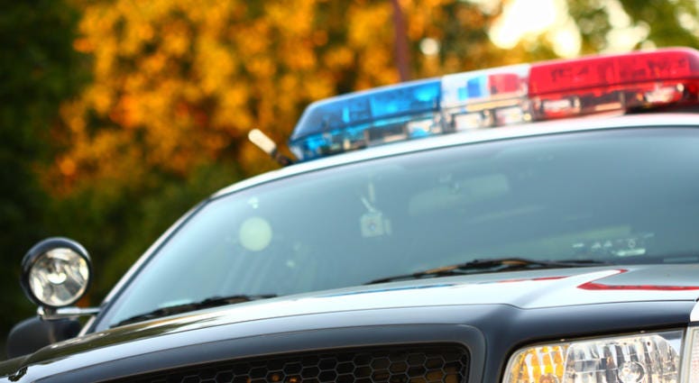 police car Front view of police car with siren and windshield