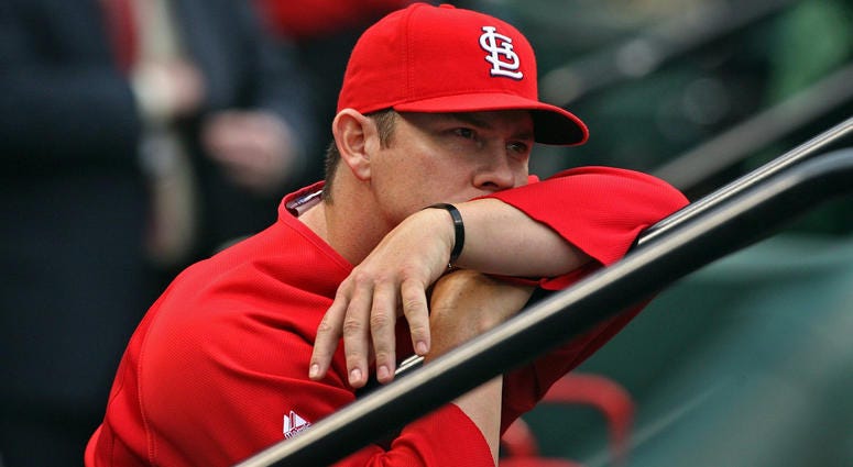 Jason Isringhausen in the dugout with the St. Louis Cardinals Jason Isringhausen in the dugout with the St. Louis Cardinals