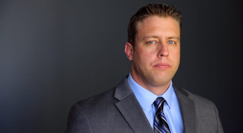 Jason Stockley has his picture taken after Judge Tim Wilson declared the former St. Louis police officer not guilty of first-degree murder in the 2011 shooting death of Anthony Lamar Smith on Friday, Sept. 15, 2017.