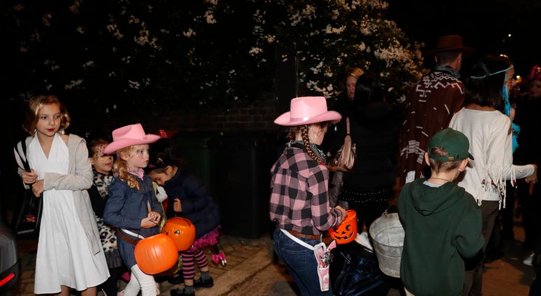 Kids are playing "Trick or Treat" Kids are playing "Trick or Treat"