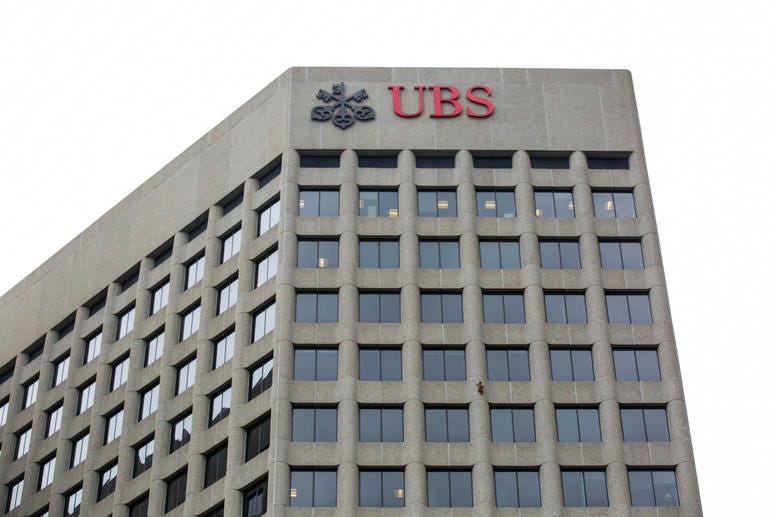 A raccoon scales the side of the UBS Tower in downtown St. Paul, Minn., on Tuesday, June 12, 2018.
