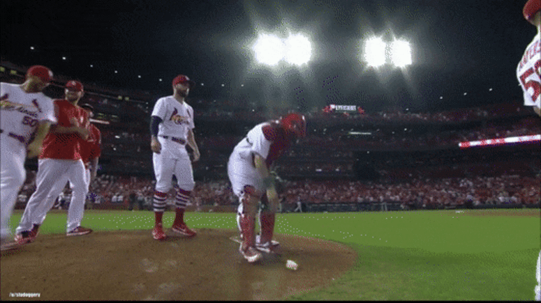 Molina throws rosin bag at Wainwright. Molina throws rosin bag at Wainwright.