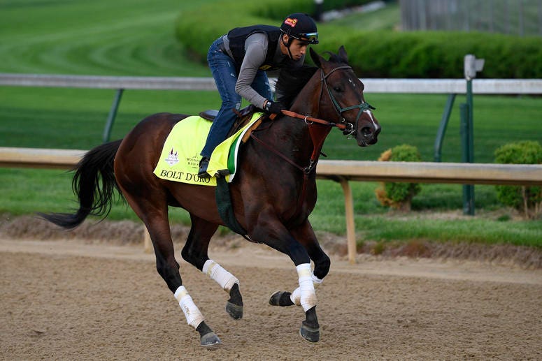 An exercise rider works Kentucky Derby entry Bolt d'Oro at Churchill Downs. An exercise rider works Kentucky Derby entry Bolt d'Oro at Churchill Downs.