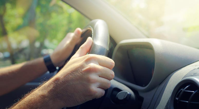 hands on steering wheel, driving