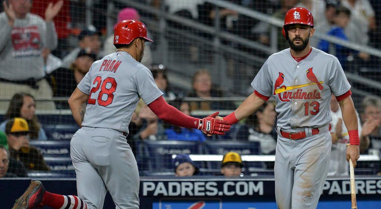 Matt Carpenter congratulates his St. Louis Cardinals teammate Tommy Pham. Matt Carpenter congratulates his St. Louis Cardinals teammate Tommy Pham.