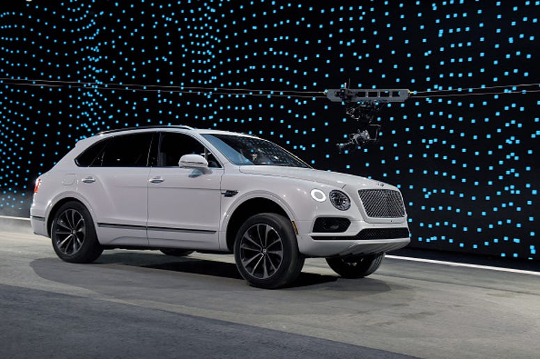Fort Worth Recibe Uno De Los Tres Bentley Bentayga En El Mundo A Bentley Bentayga is shown during a speed test against Faraday Future's FF 91 prototype electric crossover vehicle (not shown) during the FF 91's unveiling at a press event for CES 2017 at The Pavilions at Las Vegas Market on January 3, 2017 in Las Vegas