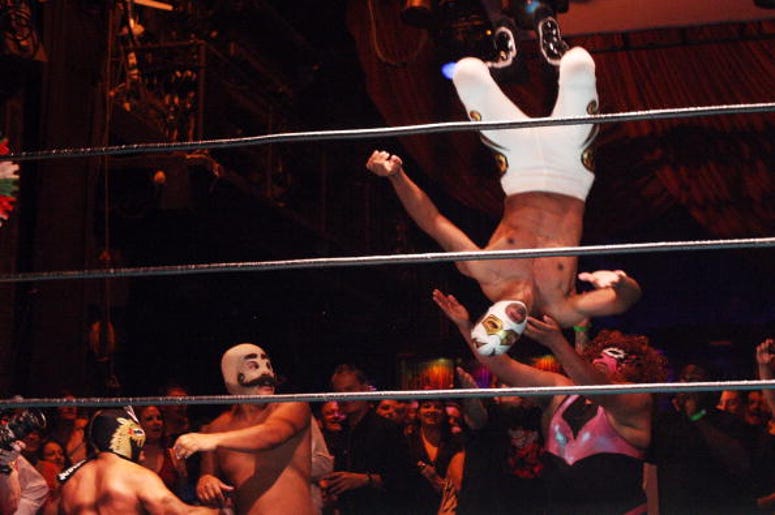 Hospitalizan A La Parka Por Golpazo En La Cabeza Luchadores, traditional Mexican wrestlers, fly over the ropes and into the audience as they perform at the Lucha Vavoom Cinco de Mayan! show at the Mayan Theater on Cinco de Mayo, May 5, 2009 in Los Angeles, California. Lucha Vavoom combines elements of t