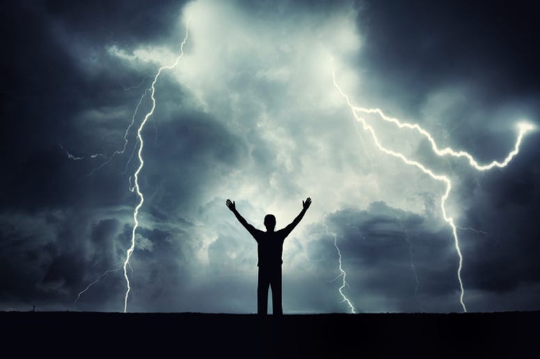 Texano Casi Muere Al Caerle Un Rayo A man silhouette on a storm background. Lord of the lightning. Background on the theme of survival, religion, philosophy, psychology.