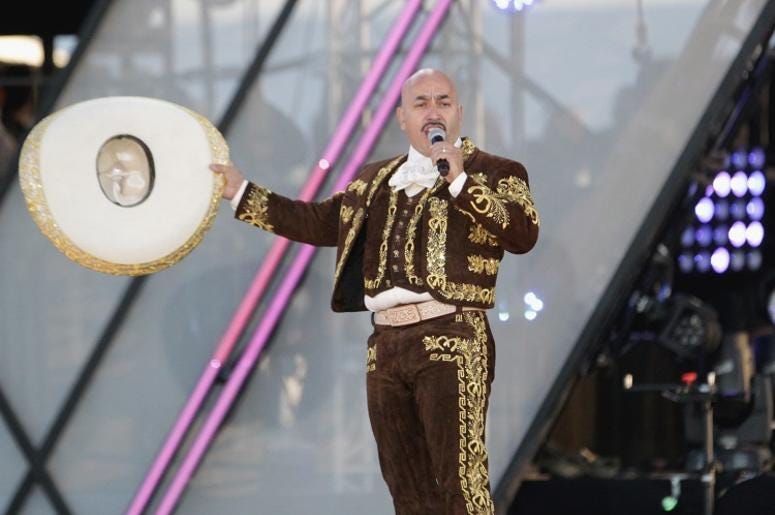 Lupillo Rivera Se Pone Peluca De Mujer En La Voz México Singer/songwriter Lupillo Rivera performs onstage at Univision and Fusion host RiseUp AS ONE at Cross Border Xpress on October 15, 2016 in San Diego, California.