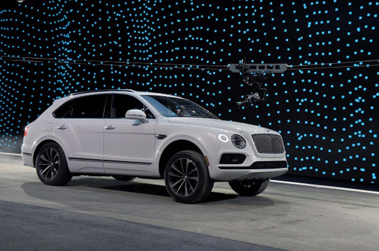Fort Worth Recibe Uno De Los Tres Bentley Bentayga En El Mundo A Bentley Bentayga is shown during a speed test against Faraday Future's FF 91 prototype electric crossover vehicle (not shown) during the FF 91's unveiling at a press event for CES 2017 at The Pavilions at Las Vegas Market on January 3, 2017 in Las Vegas