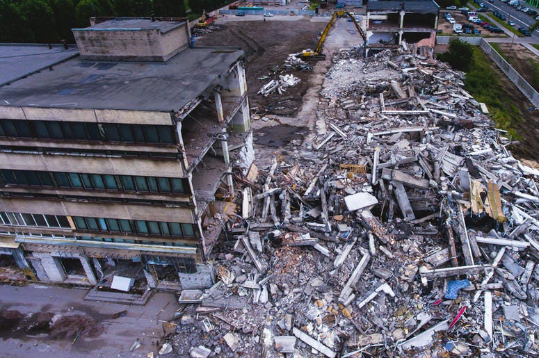 Al Menos 5 Muertos Y 13 Rescatados De Plaza Derrumbada En Monterrey A process of buliding demolition, demolished house, shot from air with drone. Earthquake, crusher.