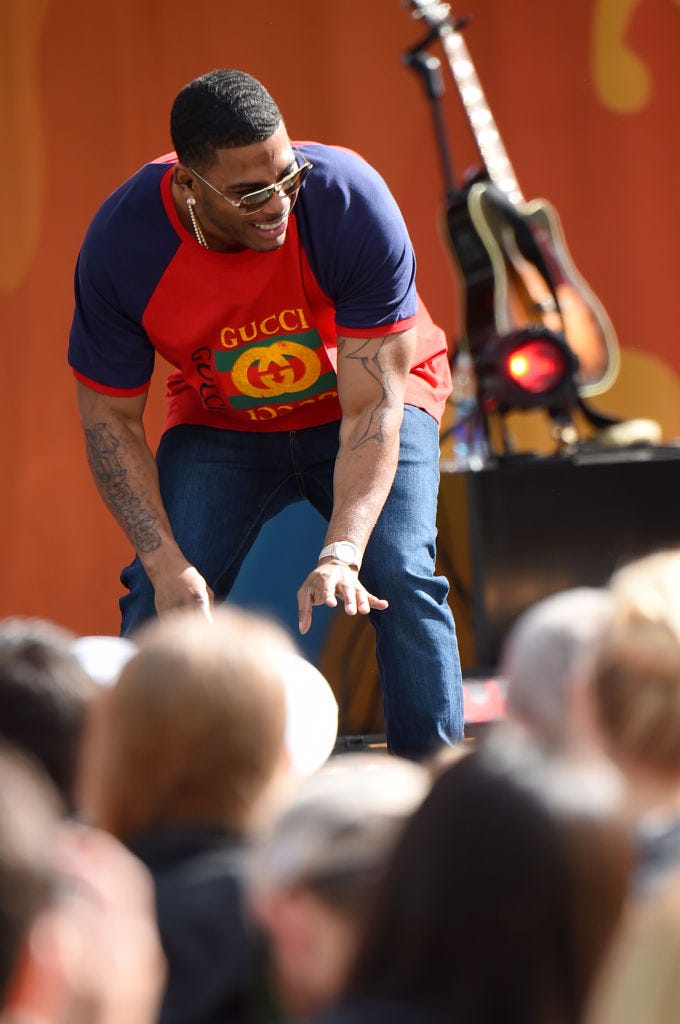 Nelly Interacts with Crowd on Stage Nelly interacts with crowd