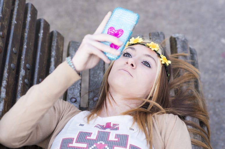 Girl Looking at Phone Girl Looking at Phone