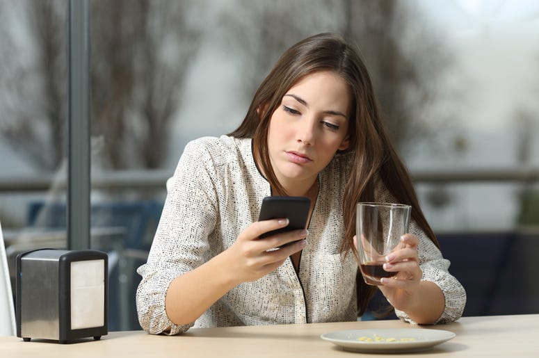 Women left alone waiting for her date. Women left alone waiting for her date.