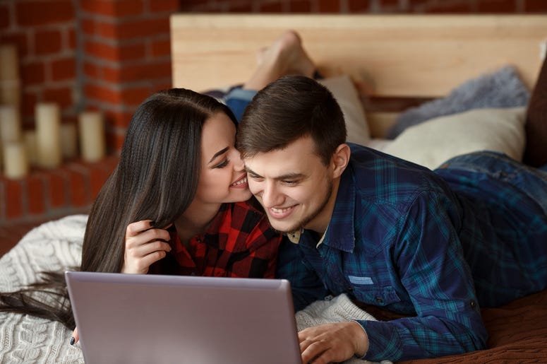 Couple on laptop. Couple on laptop.