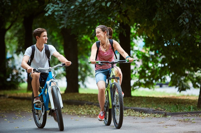 couple riding bikes. couple riding bikes.