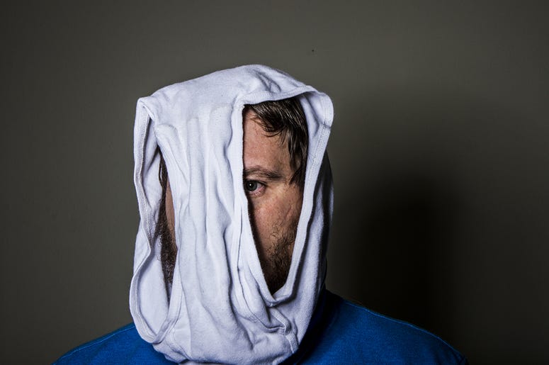 man wearing underwear on his head man wearing underwear on his head