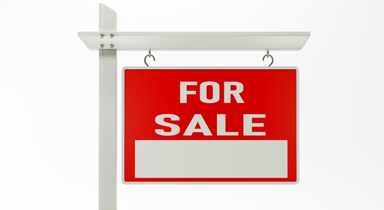 Real estate signage for sale on white