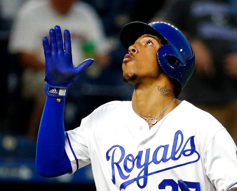 Kansas City Royals' Adalberto Mondesi celebrates as he crosses the plate after hitting a solo home run during the third inning
