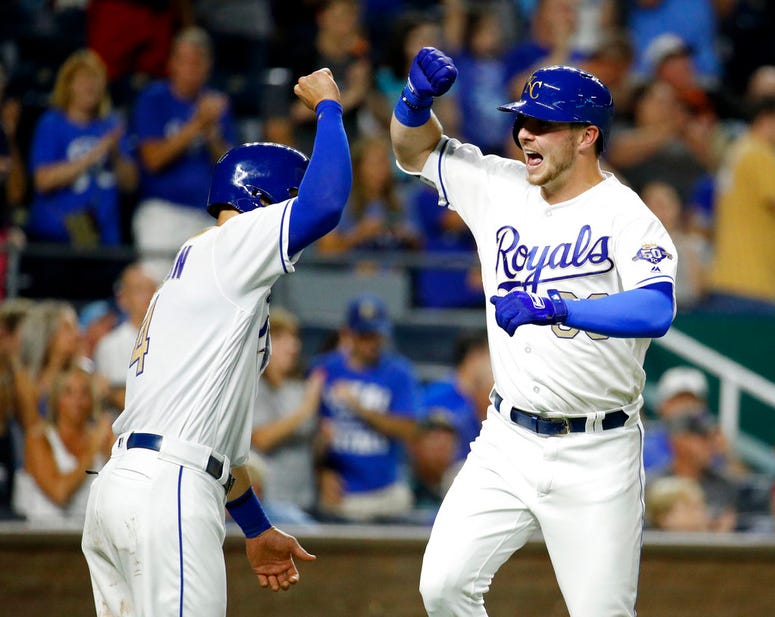 Kansas City Royals' Ryan O'Hearn, right, celebrates with Alex Gordon after hitting a two-run home run during the eighth inning