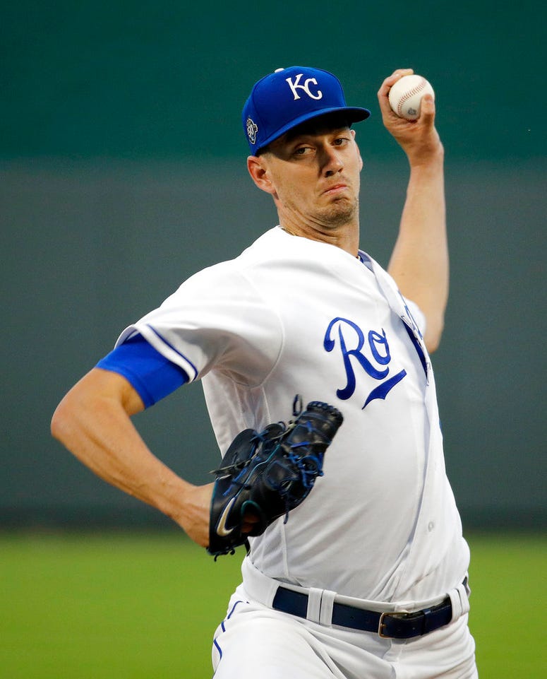 Kansas City Royals starting pitcher Eric Skoglund throws during the first inning