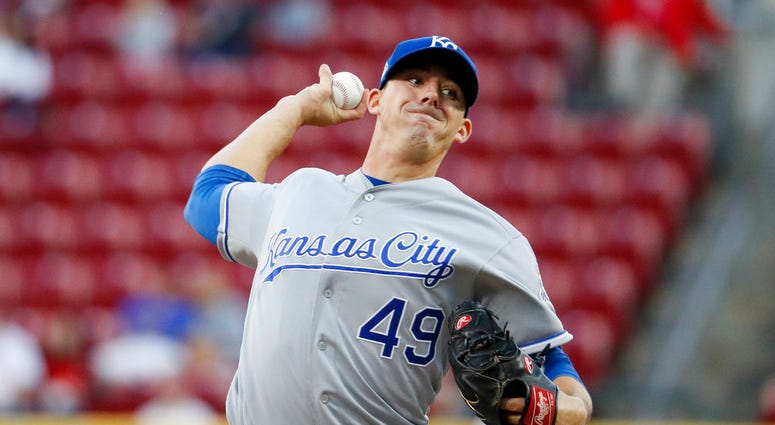 Kansas City Royals starting pitcher Heath Fillmyer throws during the first inning