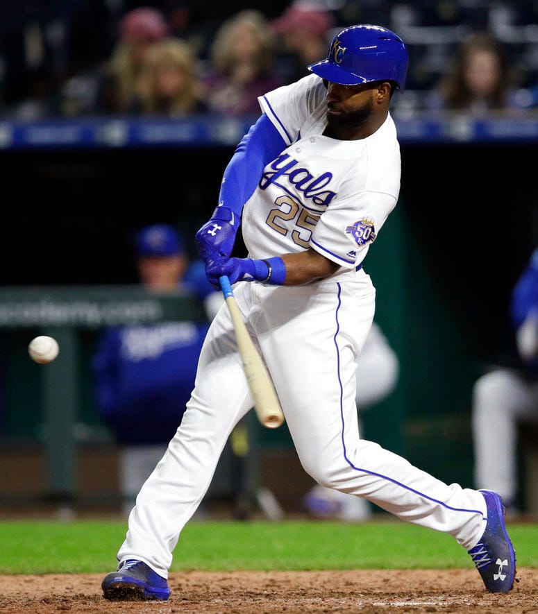 Kansas City Royals' Brian Goodwin hits a grand slam off Cleveland Indians relief pitcher Adam Plutko during the ninth inning