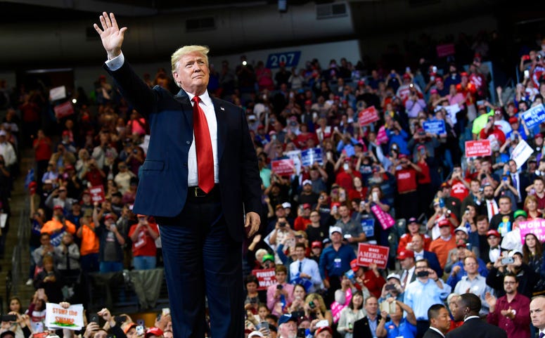 President Donald Trump arrives to speak at a rally in Council Bluffs, Iowa
