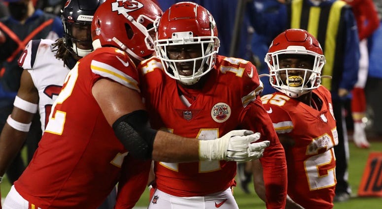 Chiefs begin title defense with 34-20 victory over Texans