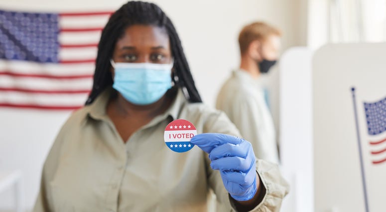 In-person voting has begun in parts of Kansas