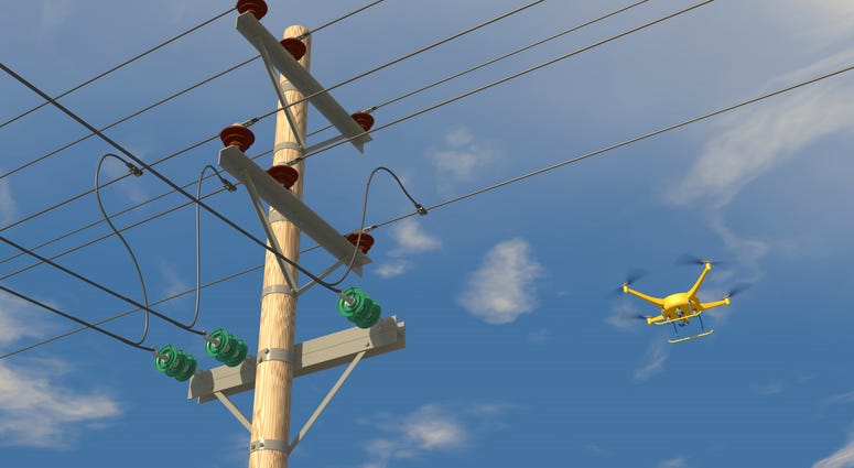 Drone inspecting power lines