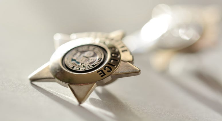Golden star police badge