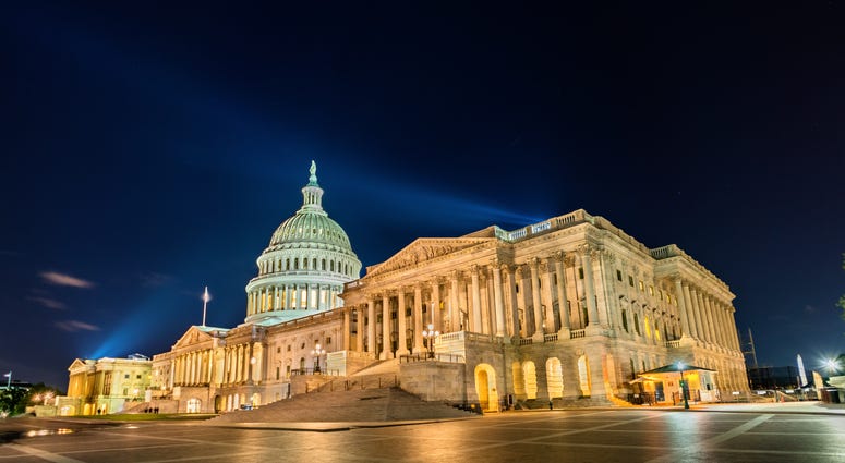 The United States Capitol Building at night in Washington, D.C.